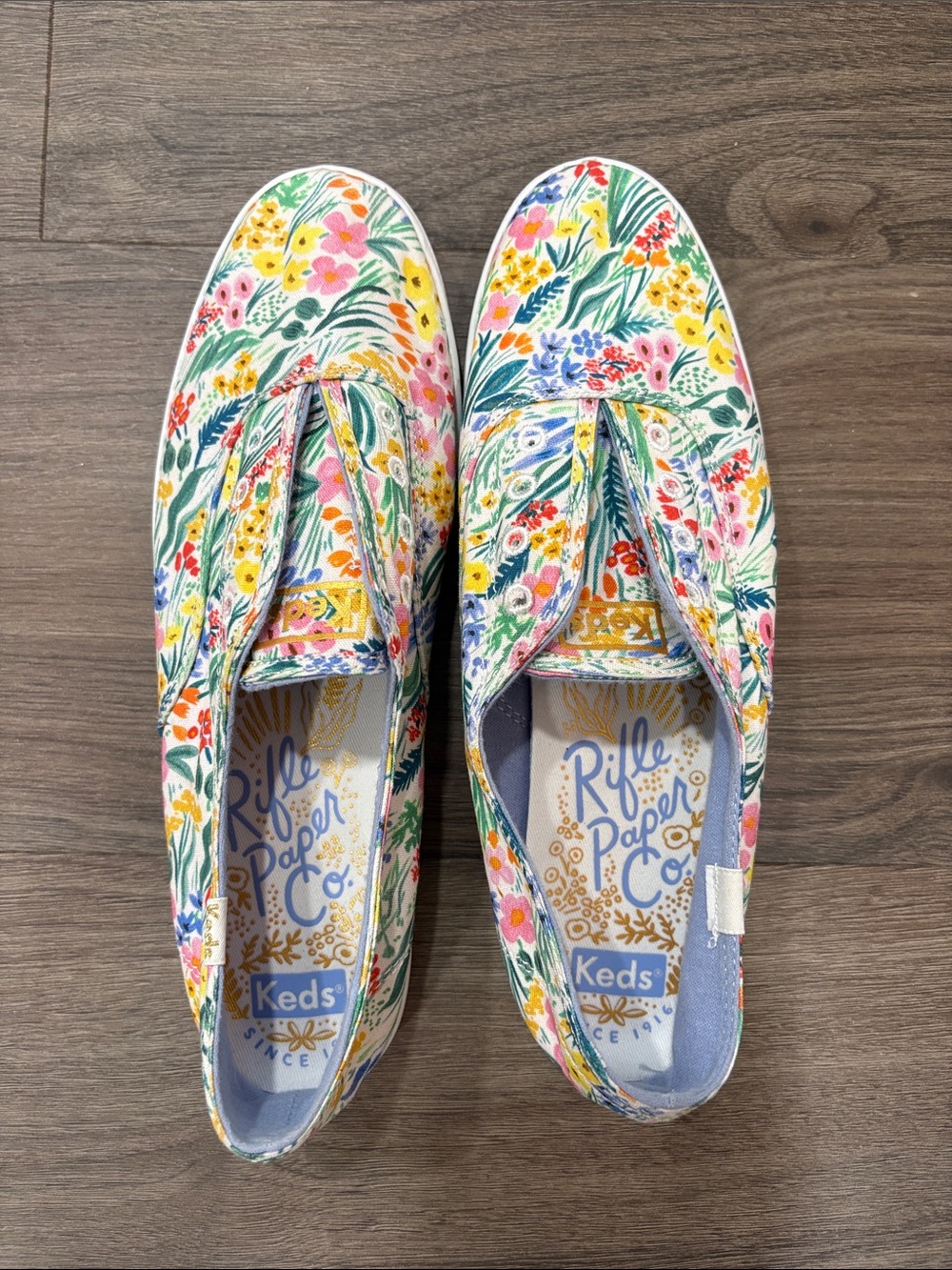 Rifle Paper Co. Floral Slip-On Sneakers in White, Yellow, Pink, Green, Blue
